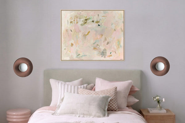 A pair of Robert Gordon Dish wall sconces in Dusty Rose either side of a bed, placed with the norsu lighting tool