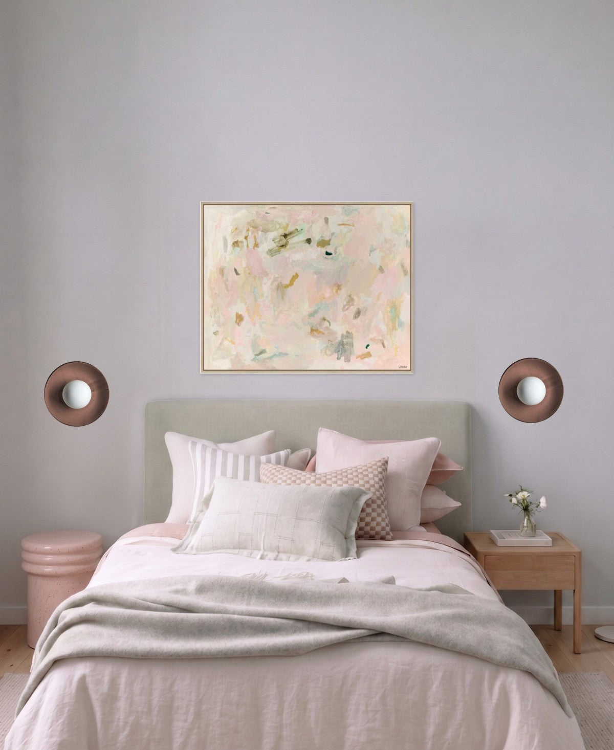A pair of Robert Gordon Dish wall sconces in Dusty Rose either side of a bed, placed with the norsu lighting tool