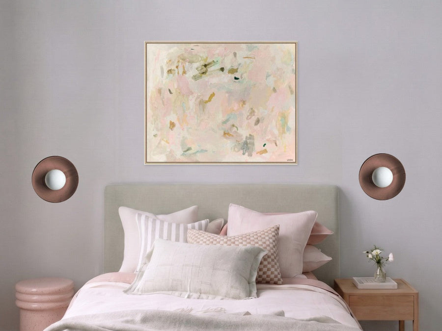 A pair of Robert Gordon Dish wall sconces in Dusty Rose either side of a bed, placed with the norsu lighting tool