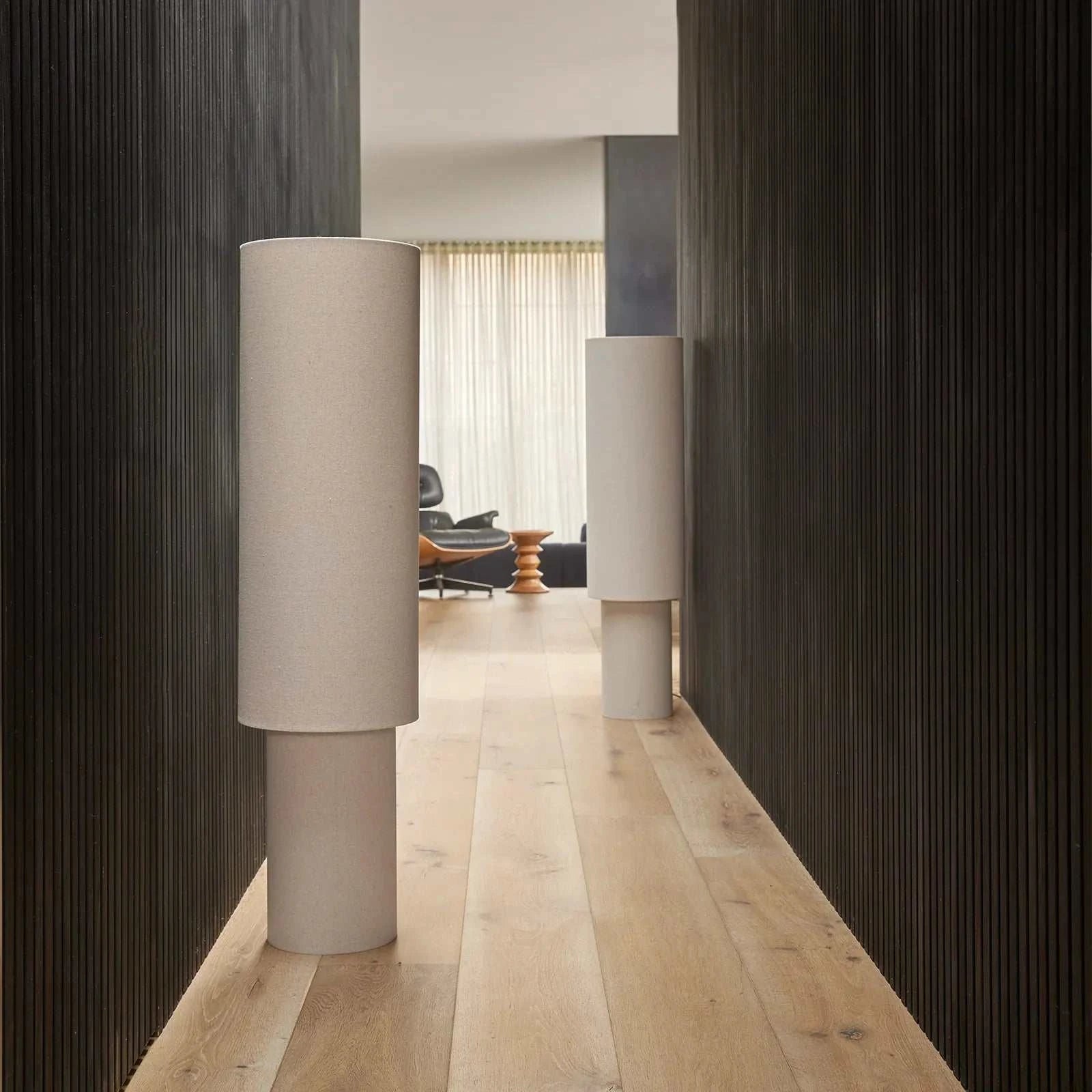 Sable Floor Lamp with linen double-cylinder shade emitting soft diffused light in minimalist design