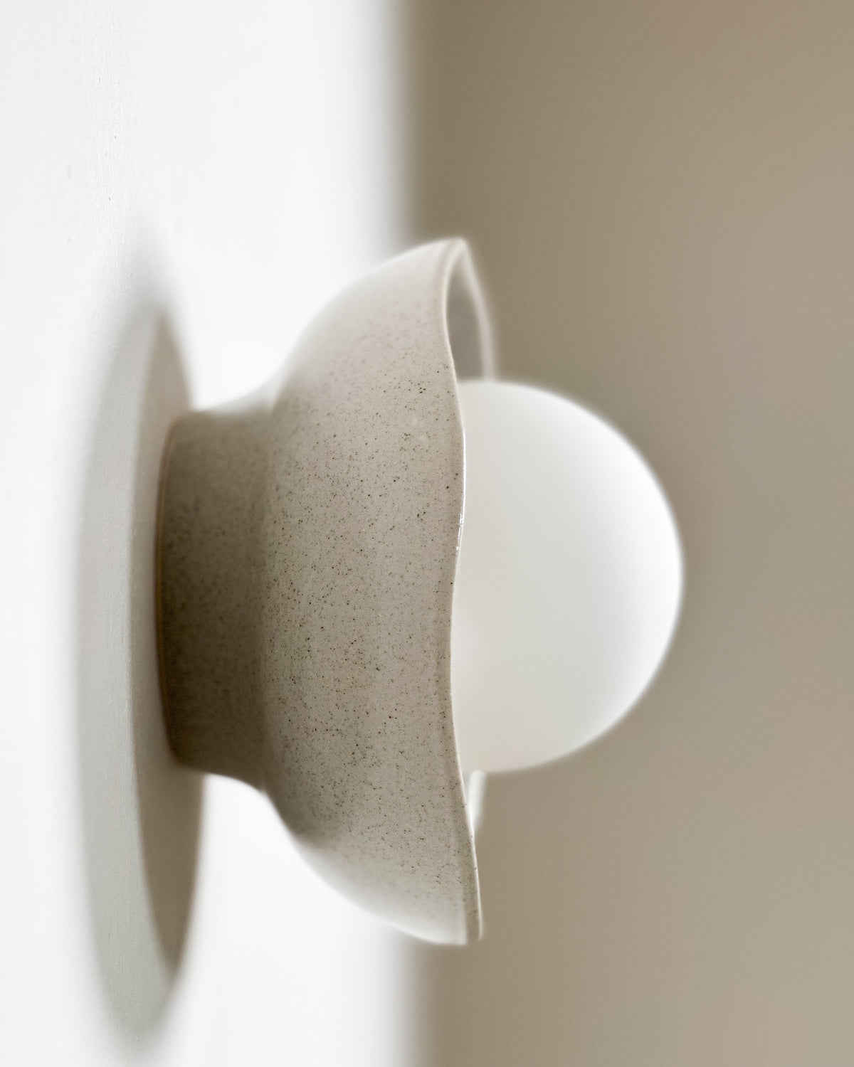 Robert Gordon Shell Wall Sconce ceramic wall light, hand glazed in Shale | norsu Interiors