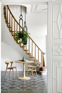 Ethnicraft Oak Torsion Dining Table, styled in a room setting