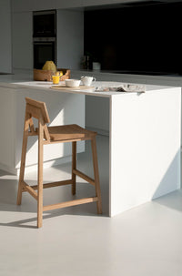 Ethnicraft N3 Kitchen Counter Stool, styled in a room setting