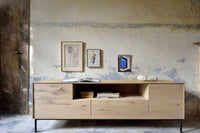 Ethnicraft Whitebird Entertainment Unit, styled in a room setting