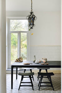 Ethnicraft Bok Dining Table - Black, styled in a room setting