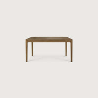 Ethnicraft Bok extendable dining table in natural teak wood with a minimalist and sturdy design