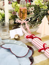 norsu STUDIO Handcrafted oversized gold bell Christmas decoration with ribbon on festive table setting