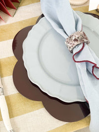 norsu Studio Linen scallop-edged blue napkins with deep burgundy edge on table setting