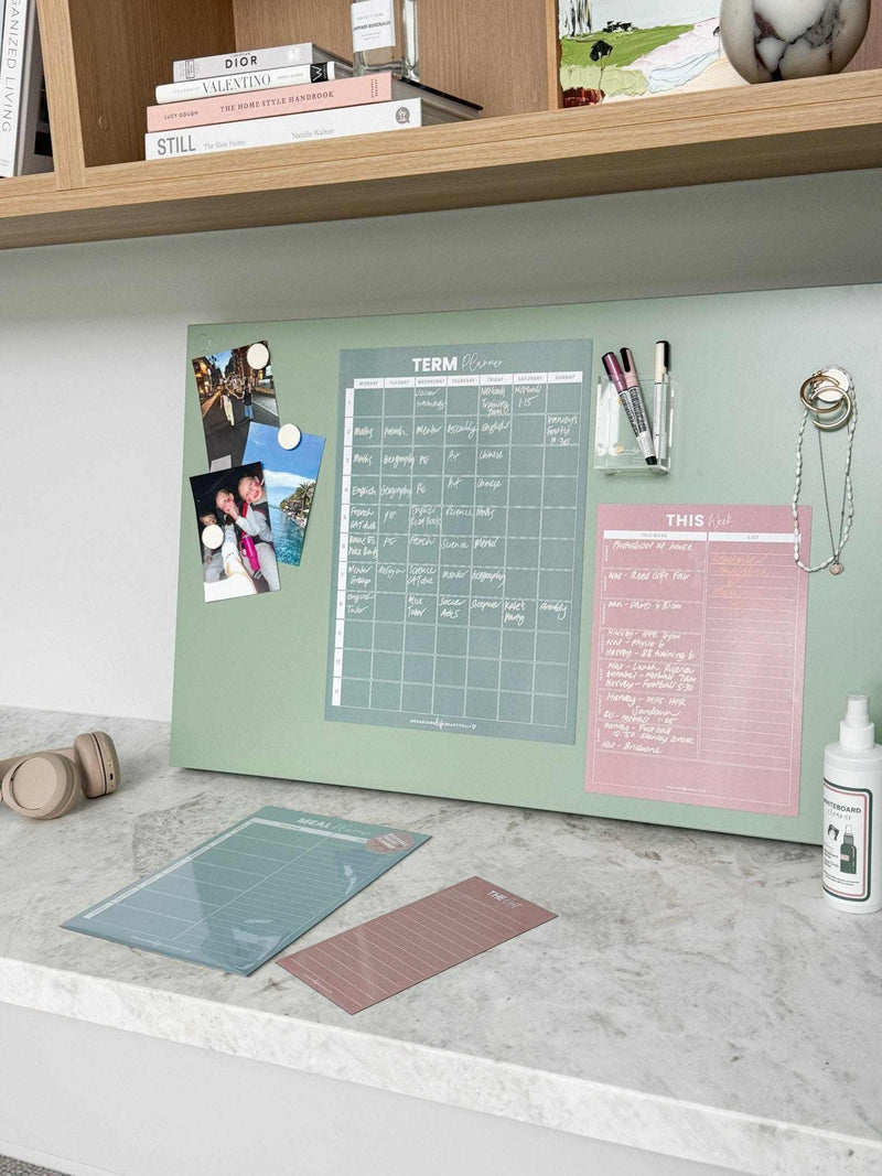 Sage-colored magnetic fridge shopping and to-do list board with reusable whiteboard surface for organizing tasks and reminders
