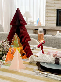 L&M Riviera Pear Grand Tablecloth with bold stripe pattern on a dining table with festive decor