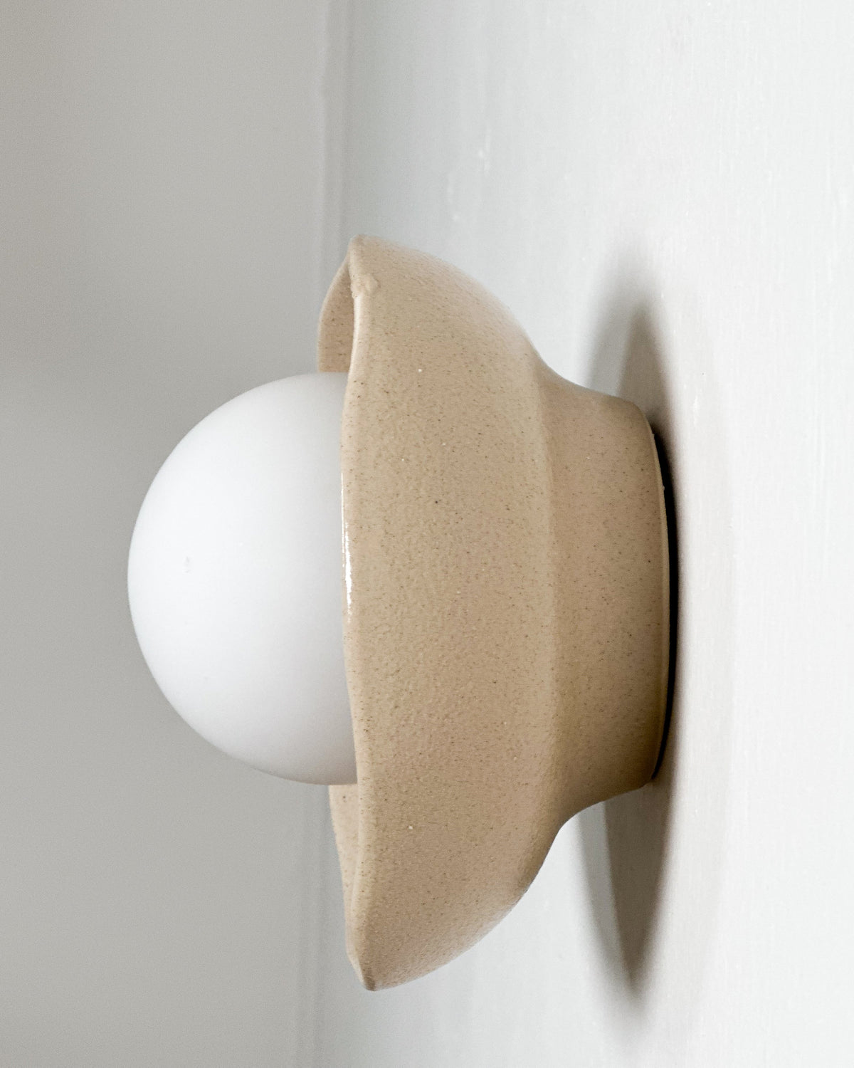 Robert Gordon Shell Wall Sconce ceramic wall light, hand glazed in Sand | norsu Interiors