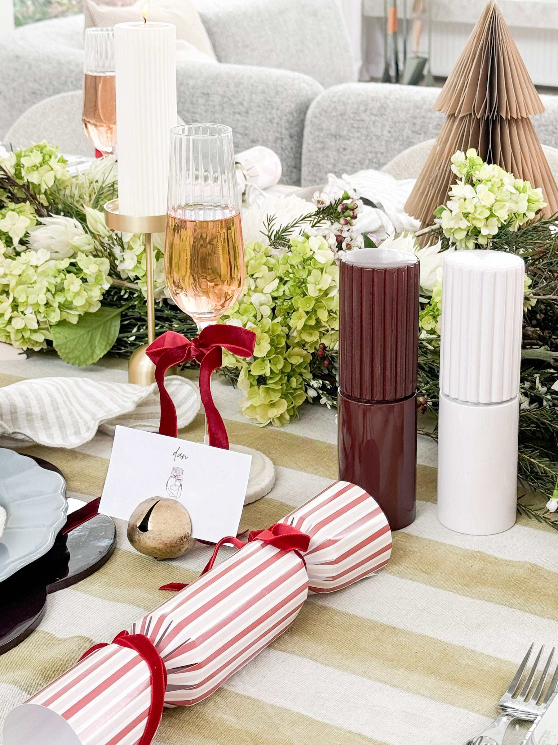 norsu Studio Salt & Pepper Grinders in soft lilac and deep burgundy with modern ribbed design on dining table setting