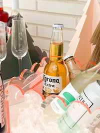 norsu Studio ochre perspex scalloped drink bucket with beverages and ice for entertaining