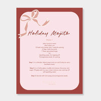 norsu STUDIO Christmas Card with burgundy bow and holiday mojito recipe on pink background