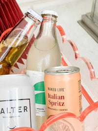 norsu Studio Perspex Scalloped wine and drink bucket in ochre with various beverages inside