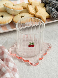Set of 4 norsu Studio Perspex Scallop Coasters in translucent ochre with scalloped edges