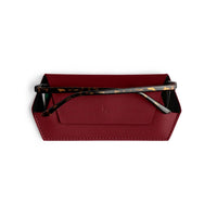 Burgundy Fox and Leo glasses case with magnetic backing and microfiber lining holding tortoiseshell frame glasses