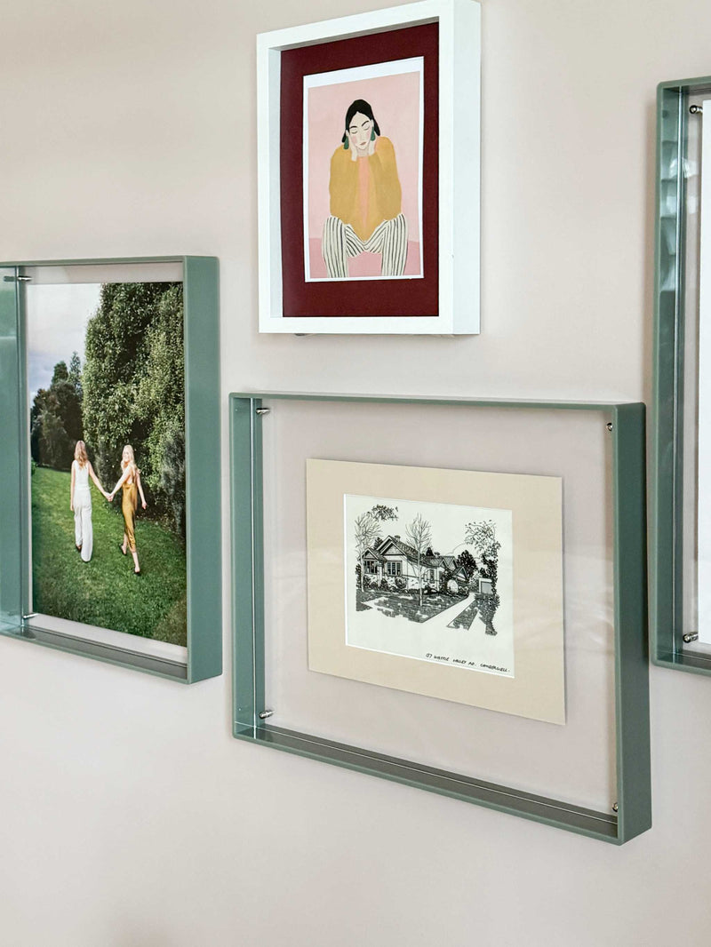 norsu STUDIO sage acrylic box gallery frame displaying artwork on wall