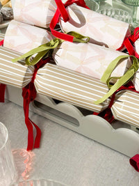 norsu STUDIO Rectangular Scalloped Tray in sage with hand-lacquered finish holding wrapped crackers