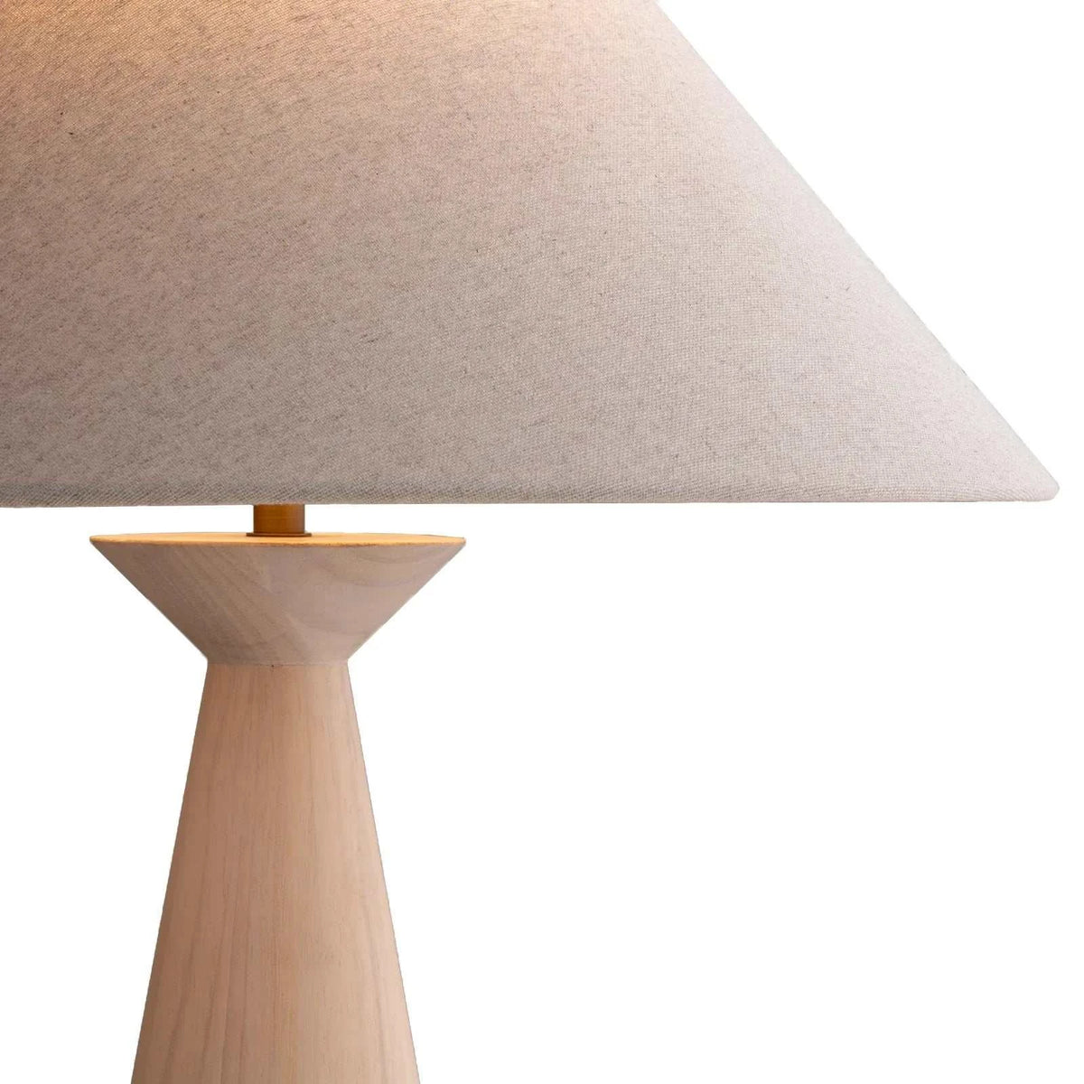 Emba Table Lamp with solid timber base and white linen shade showcasing minimalist design