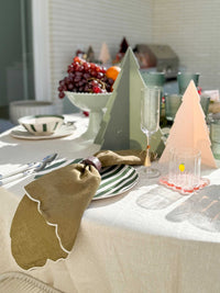 Set of 3 norsu Studio Perspex standing Christmas trees in mixed colours on a festive dining table