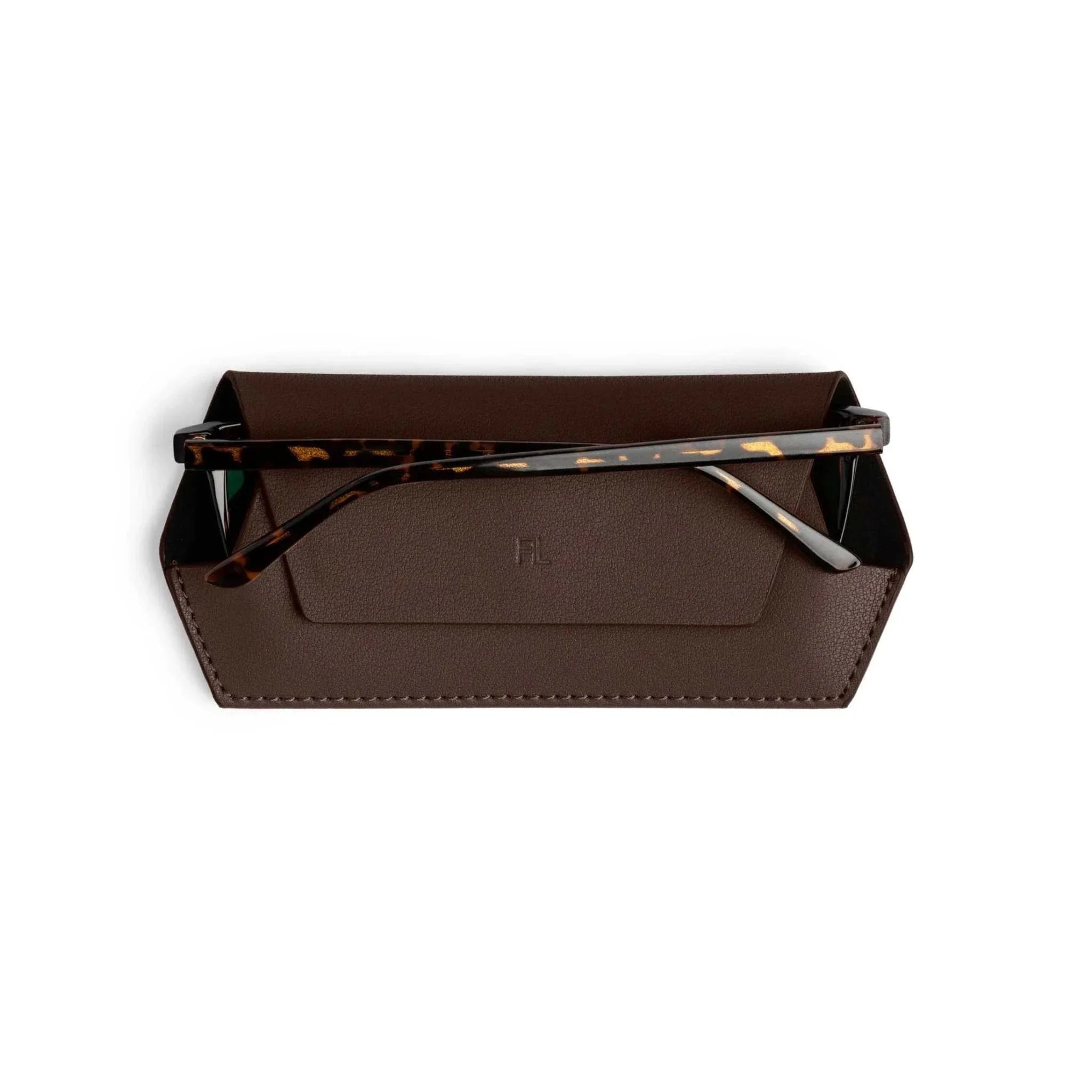 Fox and Leo glasses case in chocolate brown leather with slim protective microfiber lining and magnetic closure holding tortoiseshell eyeglasses.