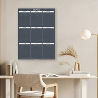 Peel & Stick Wall Planner reusable weekly planner with white chalk marker and application tool on smooth surface