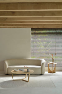 Ethnicraft Tripod Coffee Table, styled in a room setting