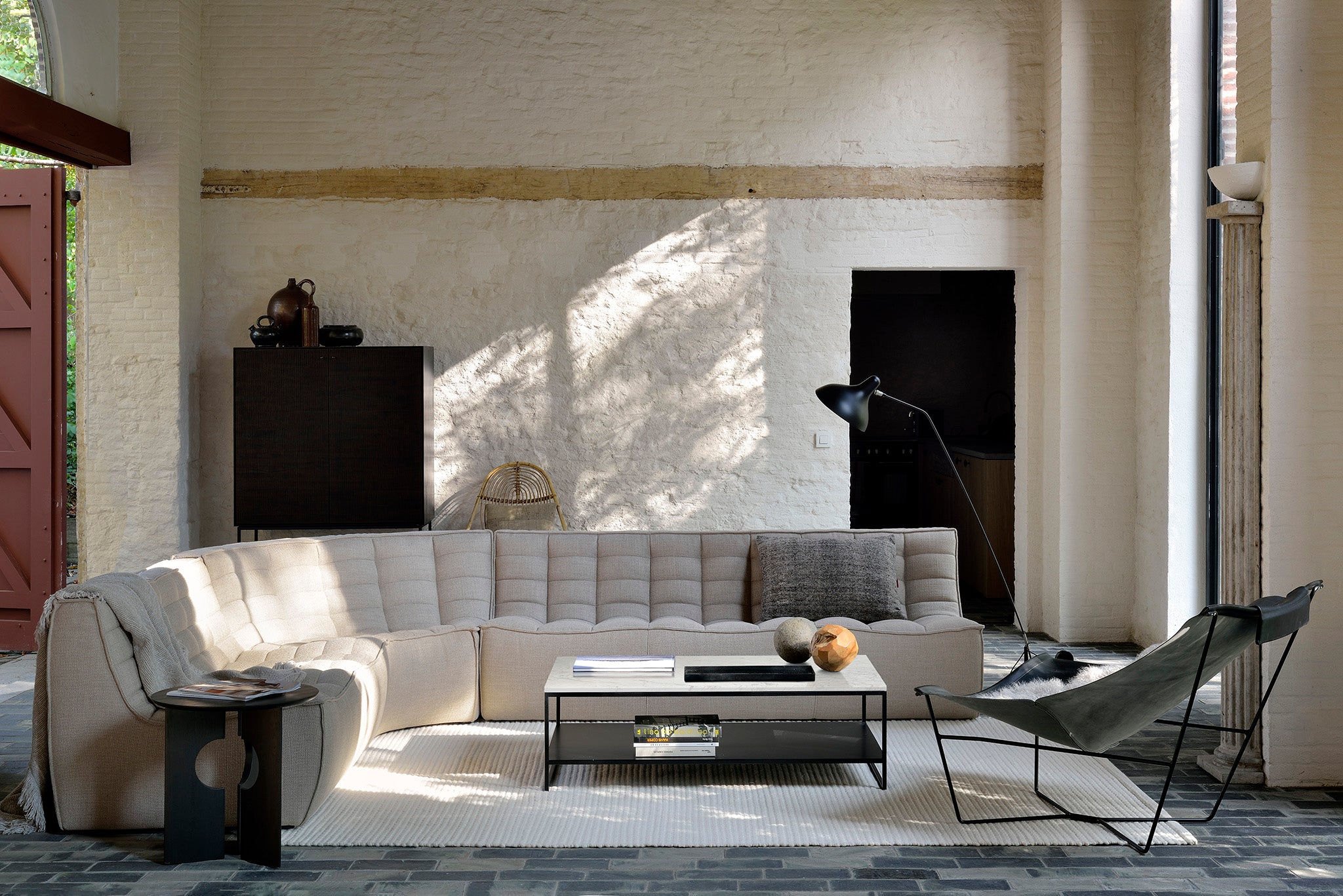 Ethnicraft Sofa N701 - 1 Seater - Dark Beige, styled in a room setting