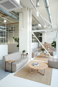 Ethnicraft Tripod Coffee Table, styled in a room setting