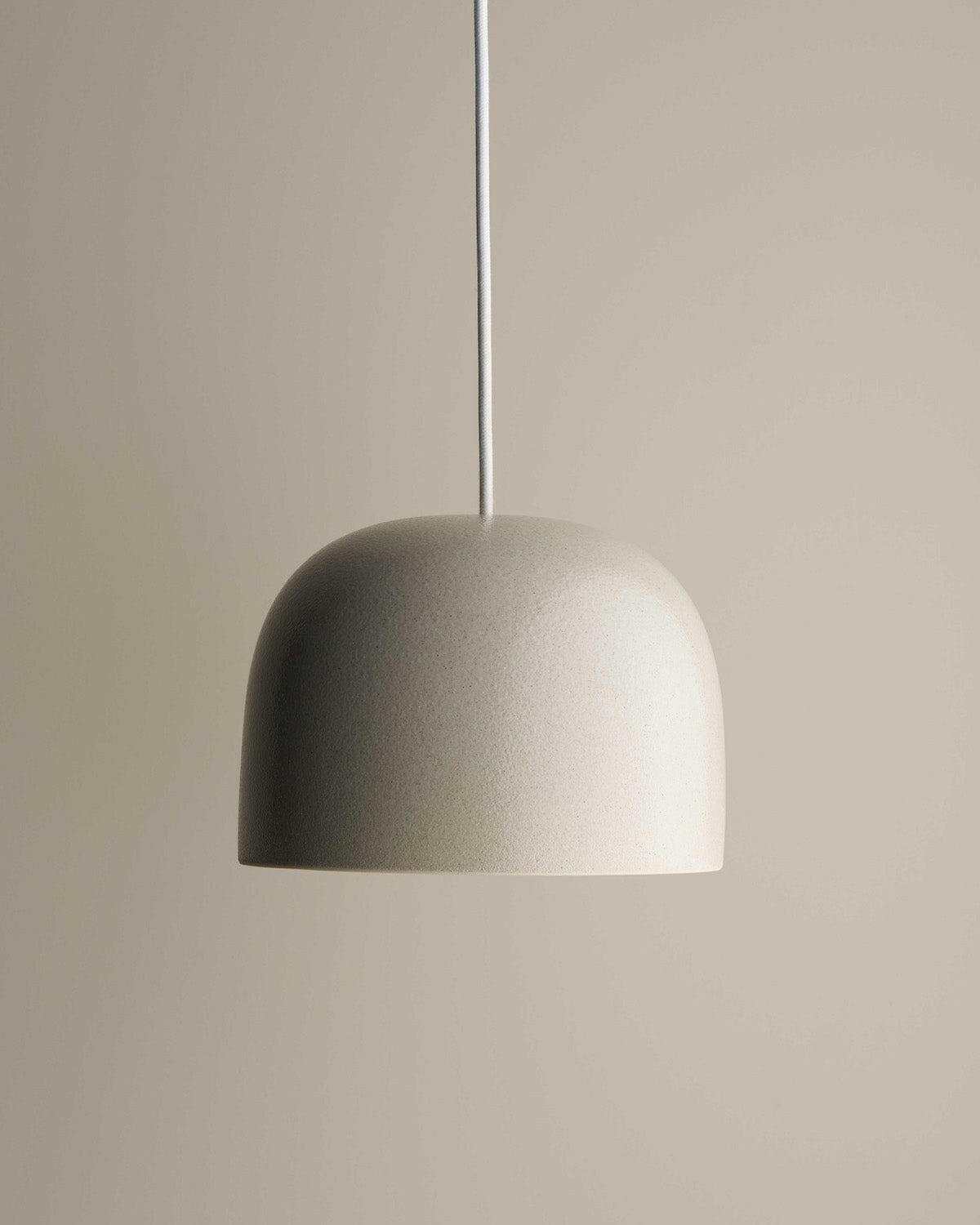 Robert Gordon Bell Ceramic pendant light in shale with traditional dome shape and hidden cord design