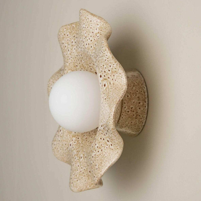 Robert Gordon Pearl Ceramic Wall Sconce Light in white ochre with textured ruffled stoneware design and round globe bulb