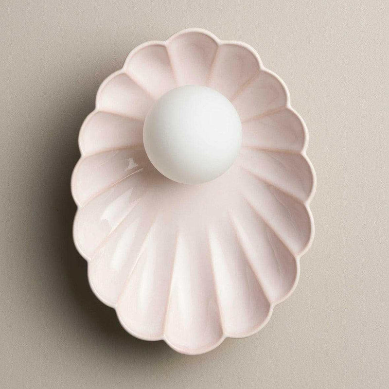 Robert Gordon Oyster Ceramic Sconce Light in rose quartz with scalloped design and round bulb
