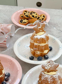 norsu Studio Bow Bowl pink and white decorative serving bowls with desserts and blueberries