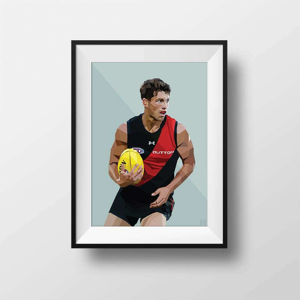 Framed DG Designs Dom Gauci kids art print of AFL player Archie Perkins in Essendon Football Club jersey holding yellow football on sage green background