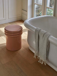 GlobeWest Hanson Round Stool Table - Cherry, styled in a room setting