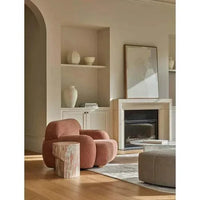 Modern living room with neutral tones featuring GlobeWest Sandscape hand-painted Sand Collection Wall Art in Dune above fireplace, warm cozy armchair, and minimalist decor