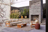 GlobeWest Harbour Knot Outdoor Rug - Tawny, styled in a room setting