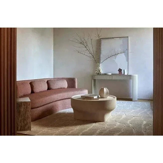 Minimalist living room featuring GlobeWest Sandscape hand-painted Sand Collection Wall Art in warm dune tones above a console table.