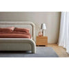 King size ivory boucle Almos Chubby Bed with plush tubular curves and fully upholstered frame in a modern bedroom setting