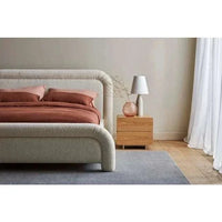 King size ivory boucle Almos Chubby Bed with plush tubular curves and fully upholstered frame in a modern bedroom setting