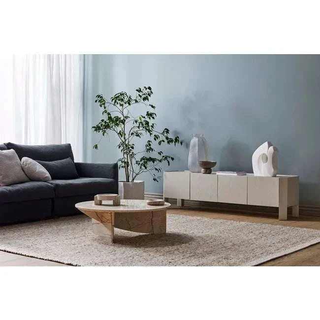 Contemporary living room with modern coffee table and decorative Rufus Hedra Bowl in black marble on sideboard