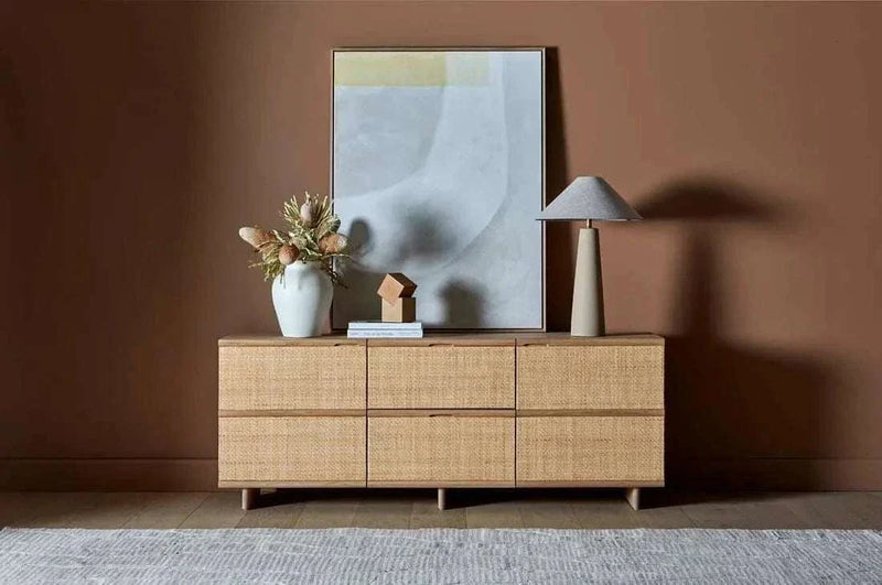 Globe West Lorne Canopy Table Lamp with textured metal base in sand tone and oatmeal cotton linen shade on wooden sideboard in modern room