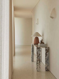 GlobeWest Lorne Pebble Table Lamp - White Sand - Ivory, styled in a room setting