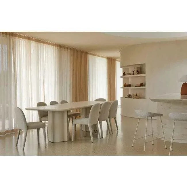 GlobeWest Leon Dining Table in porcelain with sculptural design and rounded corners in a modern dining room setting