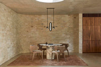 GlobeWest Tepih Neptune Rug - Ginger, styled in a room setting
