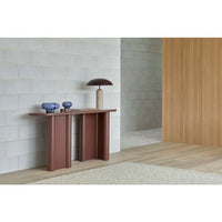 GlobeWest Easton Ellipse Table Lamp - Travertine/Burgundy, styled in a room setting