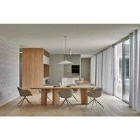 GlobeWest Daisy Spider Leg Office Chair in dijon upholstery with metal angled legs in modern dining room setting