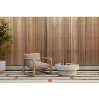 GlobeWest Seville Tile round coffee table in pearl white with glazed finish in minimalist outdoor setting