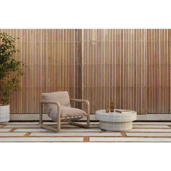 GlobeWest Seville Tile round coffee table in pearl white with glazed finish in minimalist outdoor setting